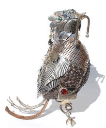 Bird with worm sculpture by Anne Steel